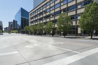 a view of an empty city street in the daytime's sun in chicago, illinois