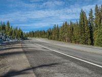 Colorado's Majestic Mountains and Forest: A Snowy Road