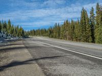 Colorado's Majestic Mountains and Forest: A Snowy Road