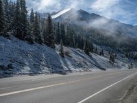 Colorado Mountain Road: Snow and Forest