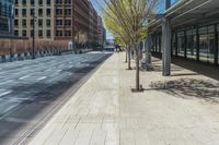 a fire hydrant in front of an office building with glass doors and windows on a sunny day