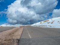 a person is on the top of a ramp on a steep hill by the ocean