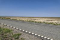 Colorado Plains: Asphalt Road through a Beautiful Landscape