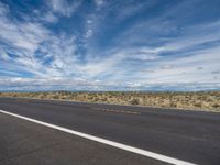 Colorado Road: Embraced by Mountains and Clouds