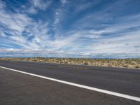 Colorado Road: Embraced by Mountains and Clouds