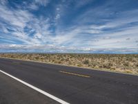 Colorado Road: Embraced by Mountains and Clouds