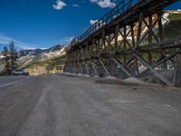 Colorado Road: Journey through Open Spaces and Forests with Mountain Views