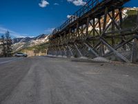 Colorado Road: Journey through Open Spaces and Forests with Mountain Views