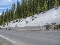 Colorado Road: A Snowy Journey Under Clear Skies