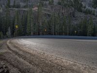 Snow Covered Road in Colorado: Mountains and Forest