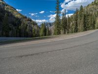 Colorado Road: Snow-Covered Mountains and Scenic Views