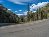 Colorado Road: Snow-Covered Mountains and Scenic Views