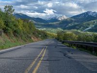 A Rural Road in Colorado: Aspen Trees and Pikes Peak