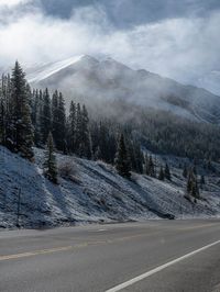 Snow Covered Road in Colorado's Mountain Landscape