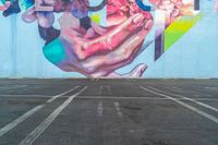 a photo of a large colorful mural painted on the side of a building with no people