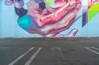 a photo of a large colorful mural painted on the side of a building with no people