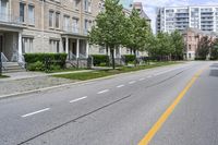 the road is lined with buildings in many different colors and designs in each area of the neighborhood