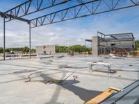 a building under construction being remodeled and ready to be used as a commercial structure with some steel beams