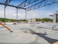 a building under construction being remodeled and ready to be used as a commercial structure with some steel beams