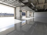 the industrial warehouse with flooring and ceilings has been completed and polished concrete is visible