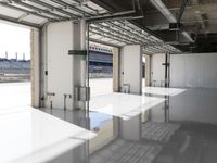 the industrial warehouse with flooring and ceilings has been completed and polished concrete is visible