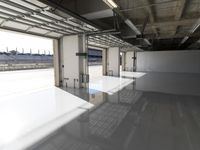 the industrial warehouse with flooring and ceilings has been completed and polished concrete is visible