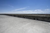 A Concrete Bridge Overlooking a Reservoir: Your Perfect Vacation Spot