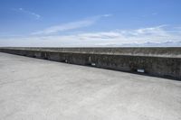 A Concrete Bridge Overlooking a Reservoir: Your Perfect Vacation Spot