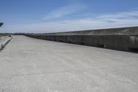 A Concrete Bridge Overlooking a Reservoir: Your Perfect Vacation Spot