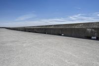 A Concrete Bridge Overlooking a Reservoir: Your Perfect Vacation Spot