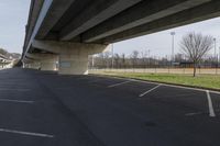 Concrete Highway with Trees under a Clear Sky