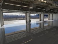 Concrete Road with Building Structure and Glass Windows