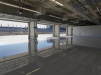 Concrete Road with Building Structure and Glass Windows