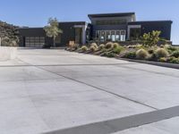 Concrete Road in the Desert Landscape: Under a Clear Sky