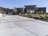 Concrete Road in the Desert Landscape: Under a Clear Sky