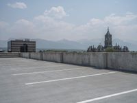 a parking lot and wall are pictured in a photo from the perspective point of view