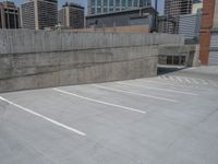 a parking lot and wall are pictured in a photo from the perspective point of view