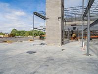 a concrete structure under construction with a lot of bricks and steel bars on each side