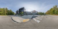 this street corner has a small circular lens image above it to show the full view of the building with a nice, contemporary look