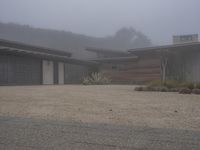 this is a nice contemporary ranch house on foggy day in the neighborhood of an unknown state