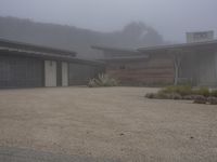 this is a nice contemporary ranch house on foggy day in the neighborhood of an unknown state