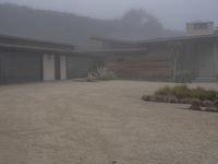 this is a nice contemporary ranch house on foggy day in the neighborhood of an unknown state