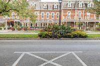 cross marks on the road in front of a beautiful mansion in the suburbs of st louis