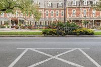 cross marks on the road in front of a beautiful mansion in the suburbs of st louis