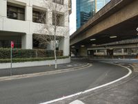 a street in city with one lane curved out of it into the middle of the road