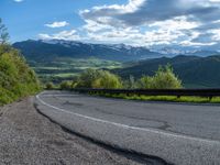 Curved Road in Colorado: Surrounded by Mountain Landscape