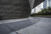 the building is shaped like a tunnel with a curved sidewall that wraps a very large area