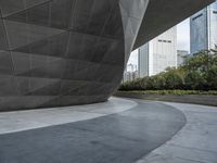 the building is shaped like a tunnel with a curved sidewall that wraps a very large area