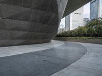 the building is shaped like a tunnel with a curved sidewall that wraps a very large area