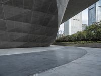 the building is shaped like a tunnel with a curved sidewall that wraps a very large area